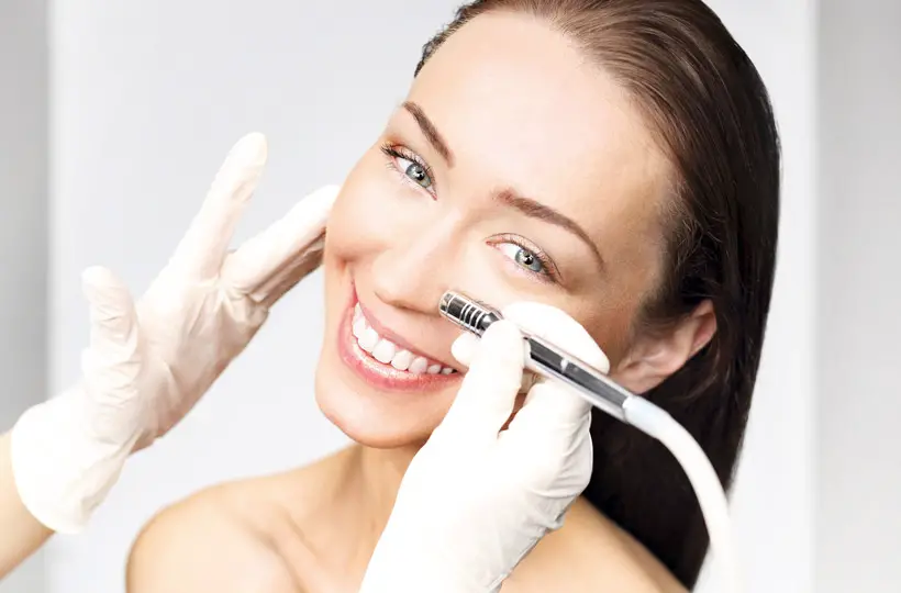 woman getting microdermabrasion
