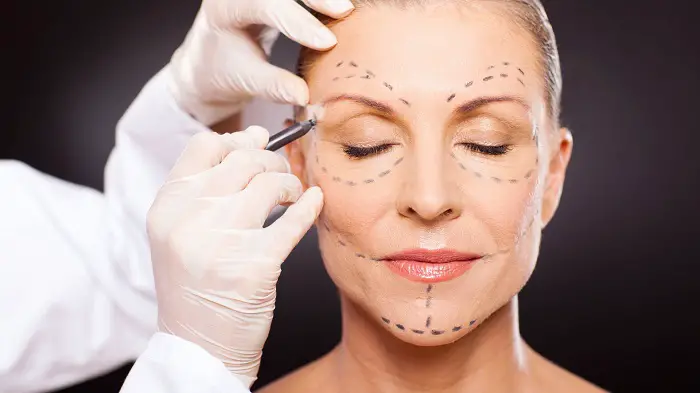 woman examined for cosmetic surgery